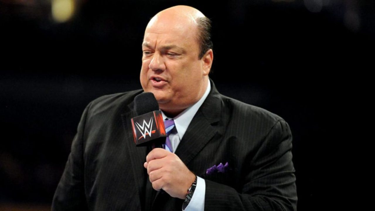 Paul Heyman si complimenta con Renee Young