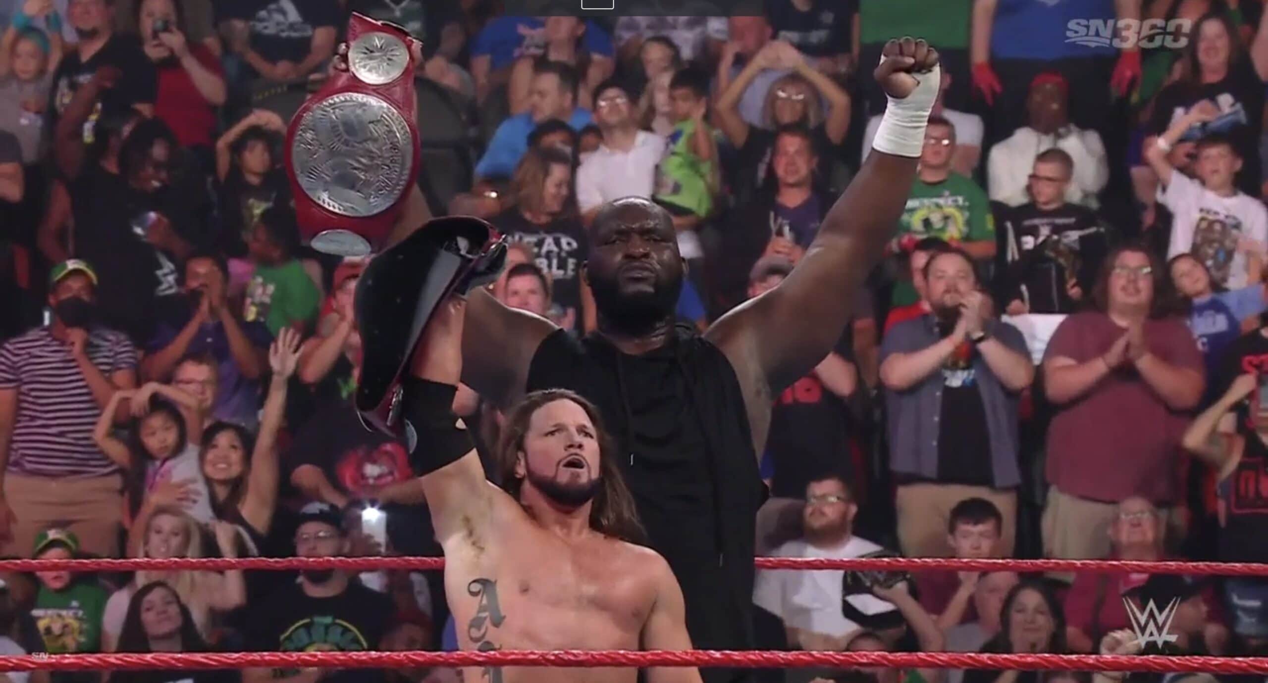 AJ Styles e Omos